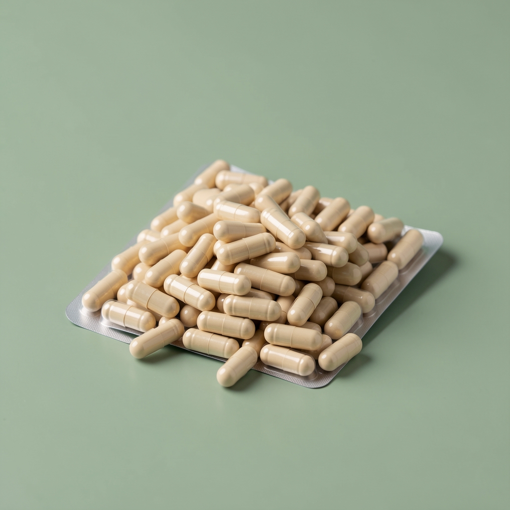 Vision Complete 90 capsule pack photographed against a calm sage green studio background